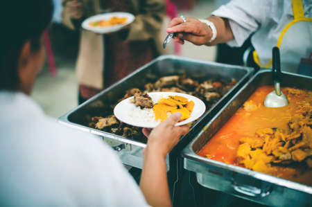 Donate food to people in society : The concept of sharingの写真素材