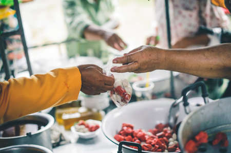 Donate food to people in society : The concept of sharingの写真素材