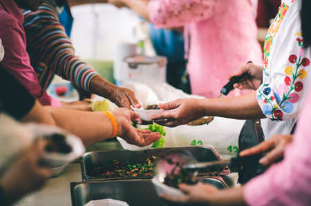 Donate food to people in society : The concept of sharingの写真素材
