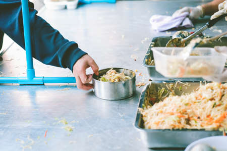 Volunteers Share Food to the Poor: concept of poverty in Asian societyの写真素材