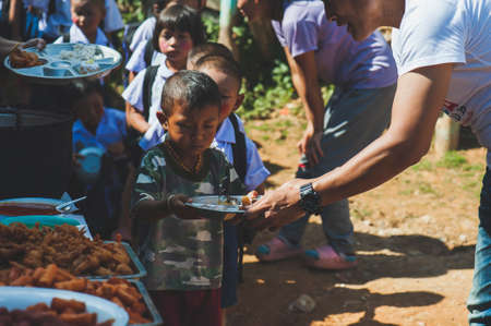 CHIANG MAI, THAILAND - JULY 19, 2021:  Volunteer to distribute food to people affected by the Covid-19 outbreak in Chiang Mai, Thailandのeditorial素材