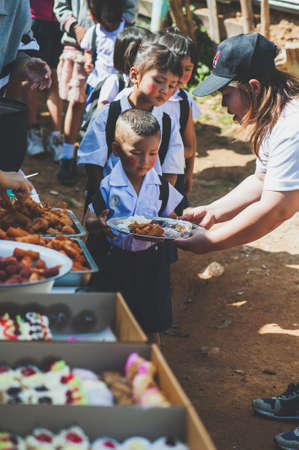 CHIANG MAI, THAILAND - JULY 19, 2021:  Volunteer to distribute food to people affected by the Covid-19 outbreak in Chiang Mai, Thailandのeditorial素材