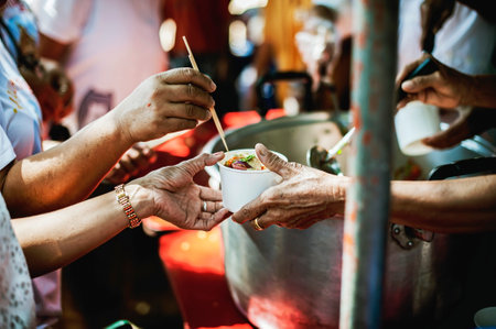 Charity food, Food for the poor hungry volunteers offering food to help the homeless : the idea of...