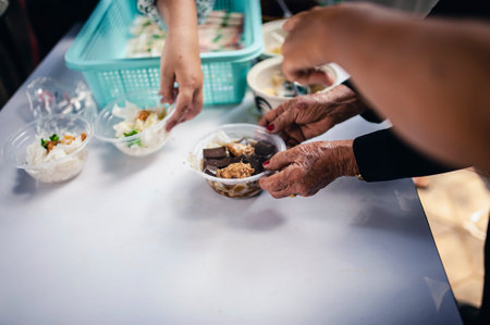 Donate leftover food to hungry people, Concept of poverty and hungerの写真素材