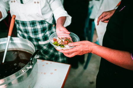 Donate leftover food to hungry people, Concept of poverty and hungerの写真素材