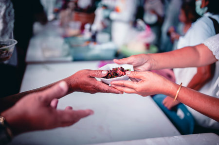 Helping the poor in society by donating food . The concept of hunger