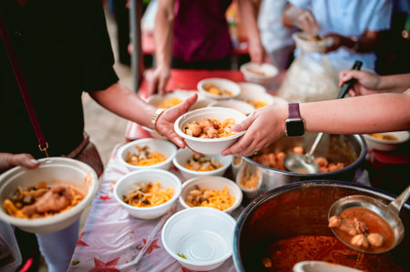 Helping the poor in society by donating food . The concept of hungerの写真素材