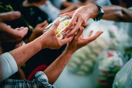 Helping the poor in society by donating food . The concept of hunger