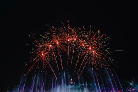 The colorful display of fireworks celebrates the fun and happiness of the night.の写真素材