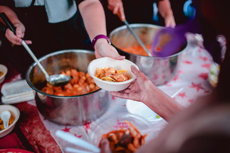 Help with feeding homeless people to alleviate hunger. poverty conceptの写真素材