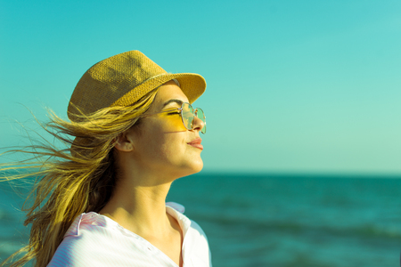 Successful woman enjoying the sunの写真素材