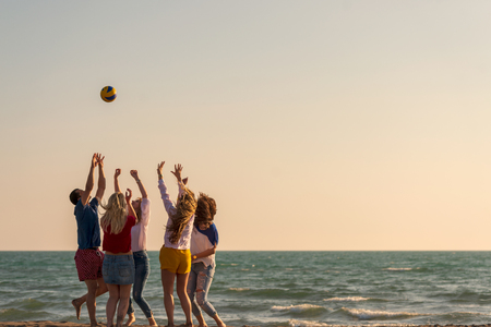 Group of friends enjoy on the beachの写真素材
