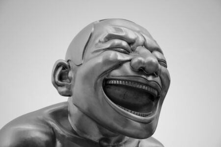 Smile Face bronze sculptureの写真素材
