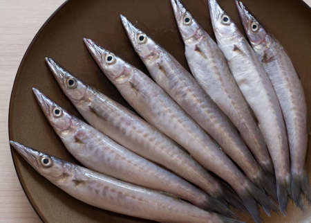 fresh raw fish ready to cookの写真素材