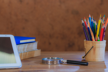 Background book on wooden table in the old earth room.の写真素材