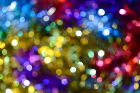 Bokeh. Holiday background. Christmas lights. Glitter. Defocused sparkles. New Year backdrop. Festive...