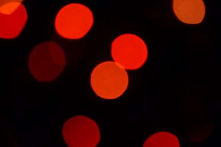 Bokeh. Christmas lights. Holiday background. Garland. Glitter. Defocused sparkles. Festive. New Year backdrop. Blinks. Carnival. Bokeh retro style photo.の写真素材