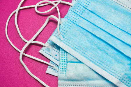 Medical masks. Coronavirus protection concept. One of the ways to reduce the spread of virus. Prevention the spread of COVID-19. Air pollution and virus protection.の写真素材