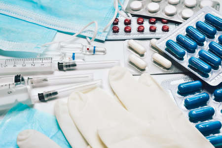Medical equipment. Coronavirus protection. Medical face mask. Sterile gloves. Syringe and drugs....