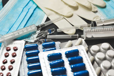Medical equipment. Coronavirus protection. Medical face mask. Sterile gloves. Syringe and drugs....