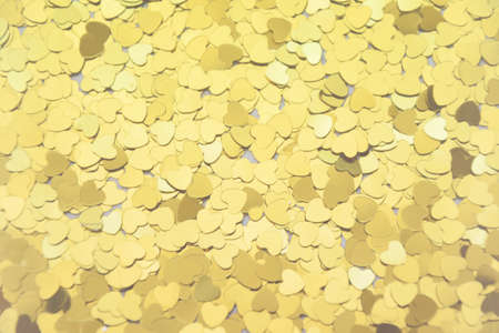 Golden hearts Valentines day background. Saint Valentines day symbol. Matte romantic love background...