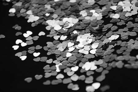Hearts sparkles Valentines day background. Black and white photo. Romantic background photo can be used for web design, wallpapers, printed products and other.の写真素材