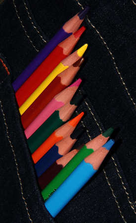 Color pencils in dennim pocketの写真素材