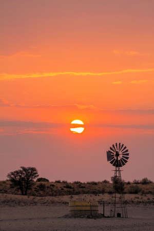 Windmill at sunriseの写真素材