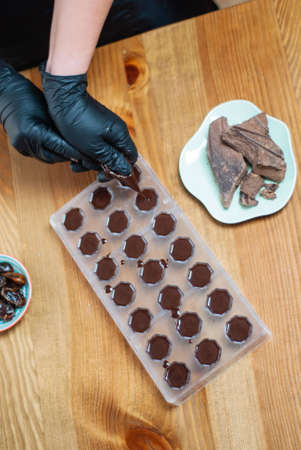 ingredients for making handmade chocolates and the process of making themの写真素材