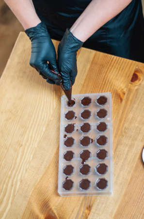 the process of making handmade chocolatesの写真素材