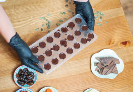 the process of making handmade chocolatesの写真素材