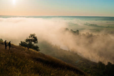 Sunrise over the cliff. morning haze at dawn under the cliff. Dawn on Zmievsky Kruchi in summer. freshnessの写真素材