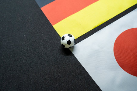 Germany vs Japan, Football match with national flagsの写真素材