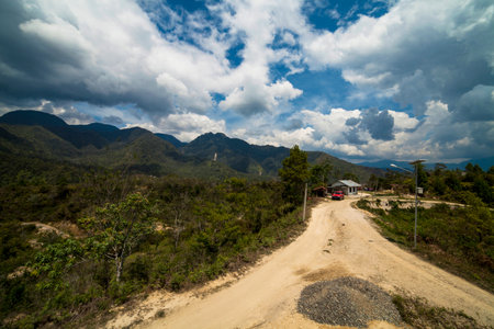 Mountain road in blue skyの写真素材