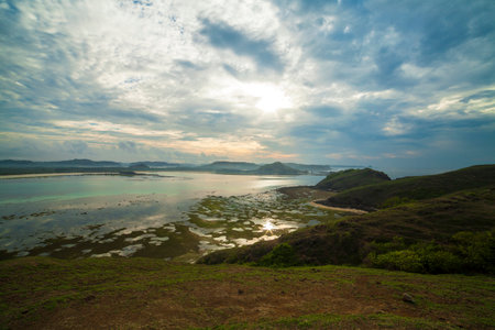 Beautiful panoramic view of tropical beach at sunrise, Lombok island. Indonesiaの写真素材