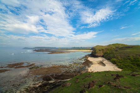 Tropical white sand with hill at kuta Beach. Lombok,Indonesiaの写真素材