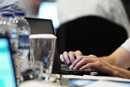 close up businessman using laptop in meeting roomの写真素材