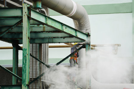 people working in the steam areaの写真素材