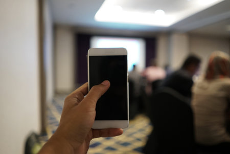 man holding the handphone