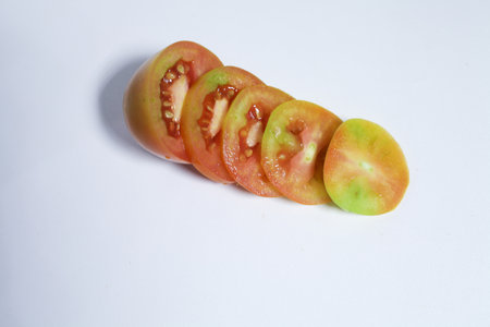 tomatoes cut neatlyの写真素材