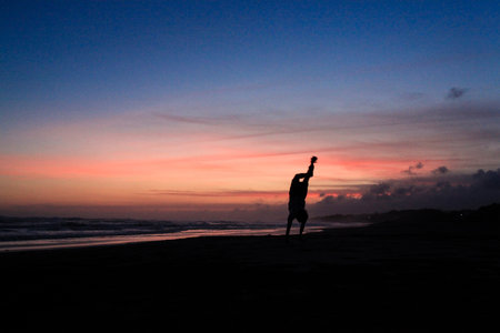 male silhouette is jumpingの写真素材