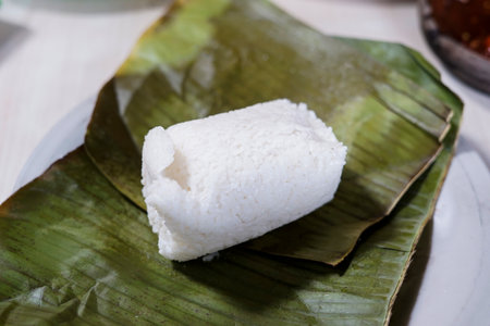 Nasi Timbel is Indonesian Traditional. Rice dish wrapped in banana leafの写真素材