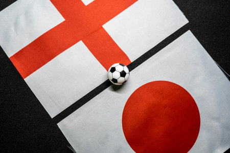 England vs Japan, Football match with national flagsの写真素材