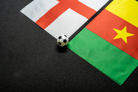 England vs Cameroon, Football match with national flagsの写真素材