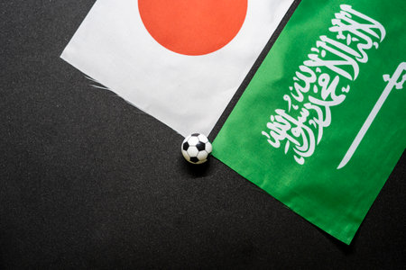 Japan vs Saudi Arabia, Football match with national flagsの写真素材