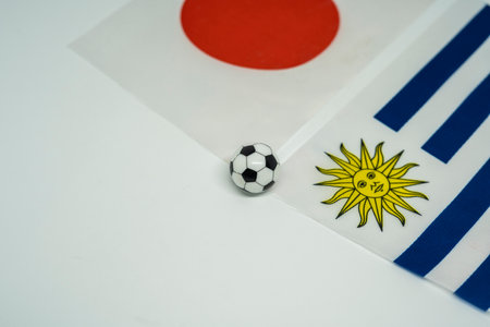 Japan vs Uruguay, Football match with national flagsの写真素材
