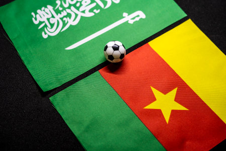 Saudi Arabia vs Cameroon, Football match with national flagsの写真素材