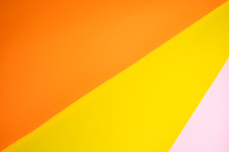 Orange, yellow and pink pastel paper color for background