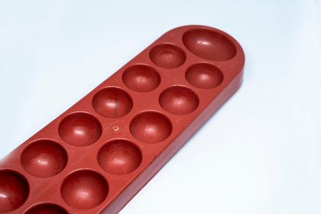 congkak, congklak or dhakon, Traditional game with lots of holes and using seedsの写真素材