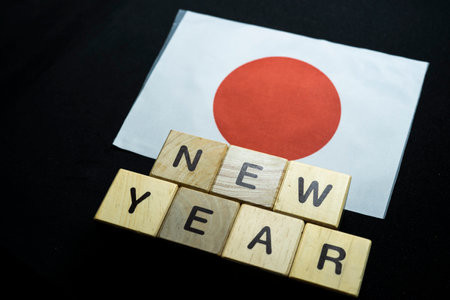 New year to people with flag on bannerの写真素材